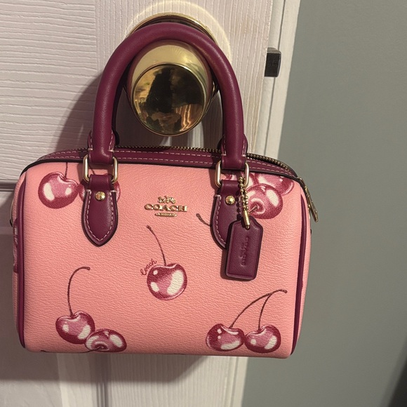 Coach Handbags - Coach Pink Mini Bag with Cherry Design